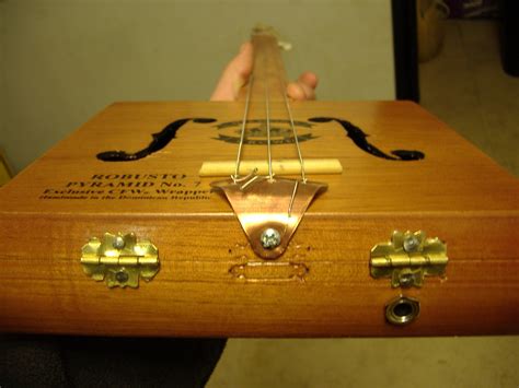 how to make a cigar box electric guitar|cigar box guitar for beginners.